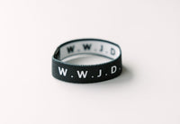 WWJD Black Reversible Elastic Fabric Bracelet